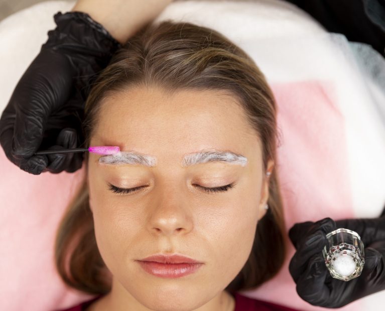 beautiful-young-woman-going-through-microblading-treatment